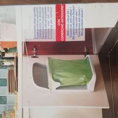 New Door mounted rubbish bag holder with anti odour lid