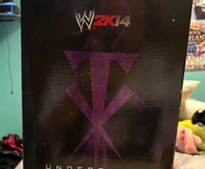 wwe 2k14 Phenom Edition complete with Undertaker autograph