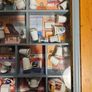 Collection Of Over 120 Ceramic And Metal Timbles In 5 Wall Hanging Cabinets. All In Good Condition.  See Photos For Same. Image 9