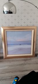 Two gold frame pictures with boats
