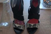 womens high heel shoes,  brand escape, color is redsnake, size 4