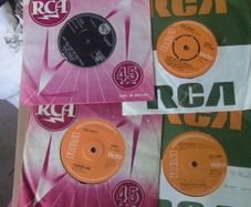 Elvis Presley - 4 x 7" Singles.