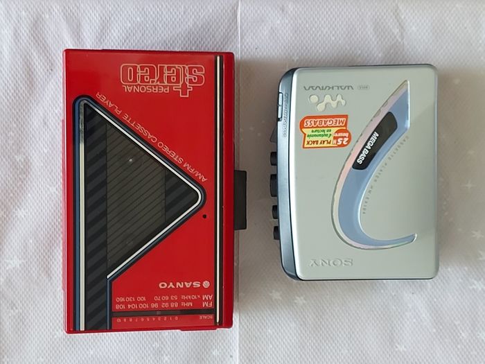 Sony Walkman and Sanyo AM-FM Stereo cassette Player, excellent cosmetic condition, no cables or batteries