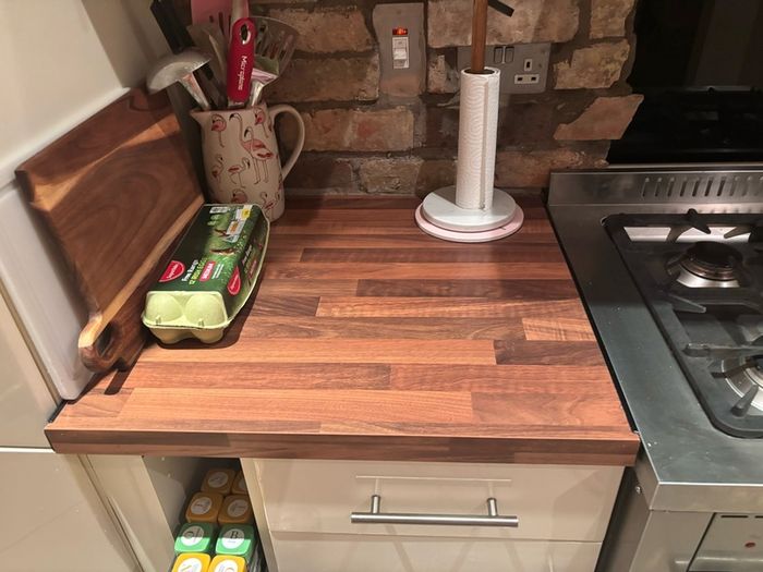 Fitted kitchen. Light cream high gloss kitchen