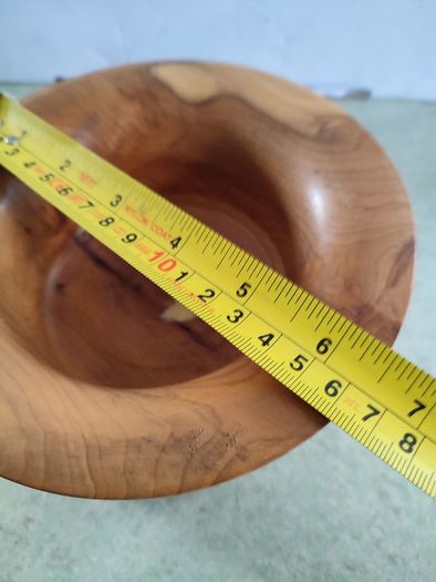 Beautiful  handmade wood turning. wood bowl has natural knot inside the bowl excellent condition