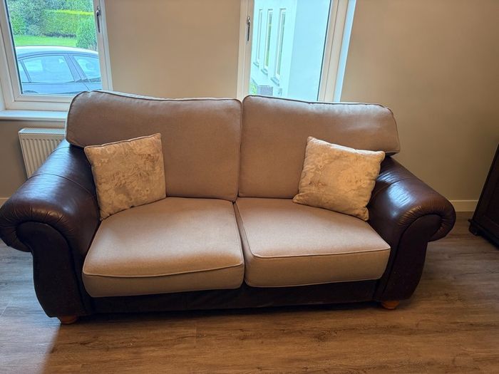 Two Sofas and footstools