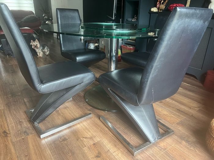 Glass dining table with rotator and 4 leather chairs