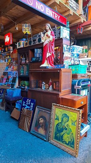 Antique holy statue and pictures