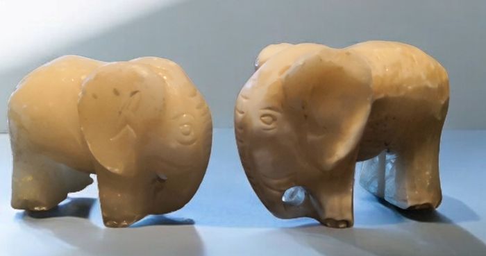 Pair of heavy white marble elephant bookends