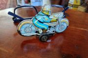 Vintage tinplate motorcycle
