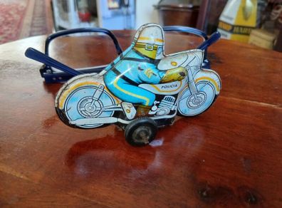 Vintage tinplate motorcycle