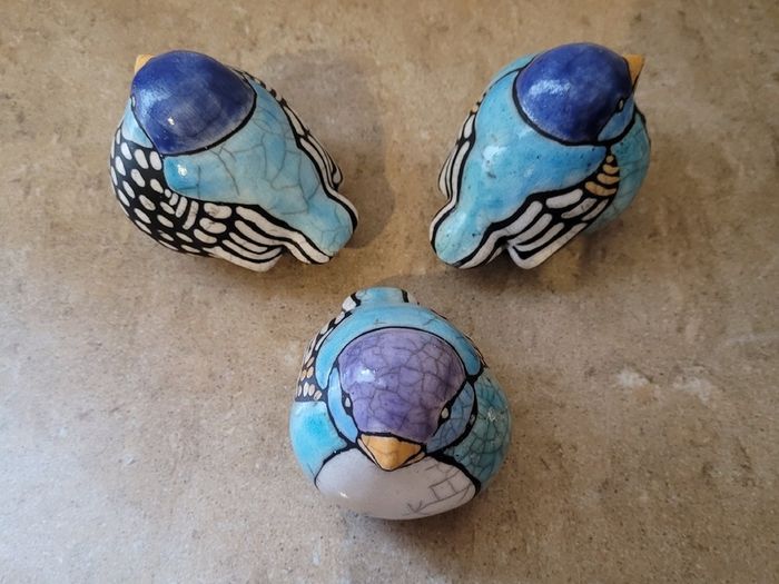 Mid-century trio of handpainted ceramic birds