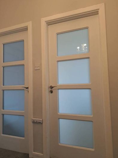 white internal solid wood laminate covered doors x 3