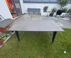 Large concrete resin topped table available free to take.