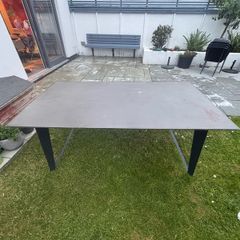 Large concrete resin topped table available free to take.