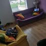 Unique Purple Curved Sofa & Yellow Accent Chair with Rainbow Cushions Image 2