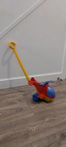 Push toy helicopter