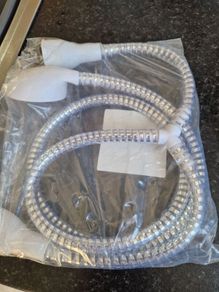 Shower head / bath extension