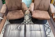Swivel armchairs with foot rest