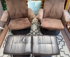 Swivel armchairs with foot rest , table