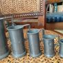Antique French solid pewter measuring tankards Fleurs de lys complete set Image 4