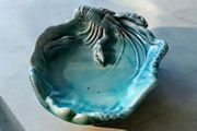Light blue pre eozin glazed lobster dish