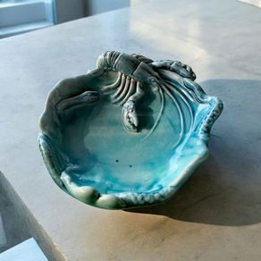 Light blue pre eozin glazed lobster dish