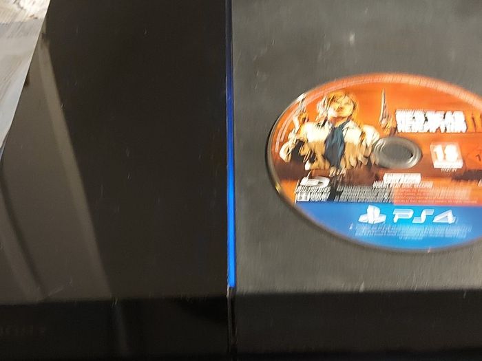 SONY Playstation 4, Model CUH-1003A, Plus RED DEAD II, Redemption PS4 Game, Power Cable and 1 Controller, in excellent cosmetic condition