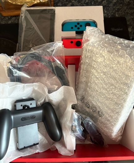 Nintendo Switch Neon Red/Blue with Improved Battery Life- Barely used