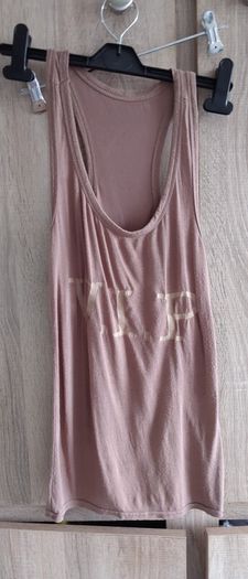 VIP tank top fits size  8/10