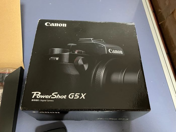 canon G5x complete in box as new. Only set up but never used . Spare camera