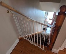 Baby gate top of the stairs