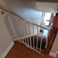 Baby gate top of the stairs