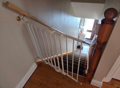 Baby gate top of the stairs