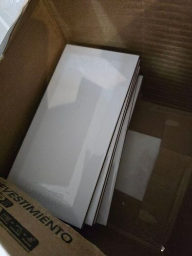 tile adhesive and 15 tiles white pure white ready for collection