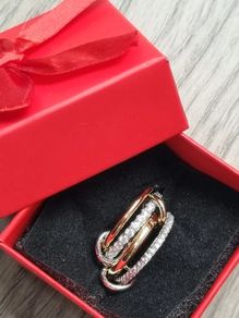 Gold and silver ring in gift box