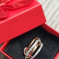 Gold and silver ring in gift box