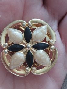 Vintage gold tone dress clip.
