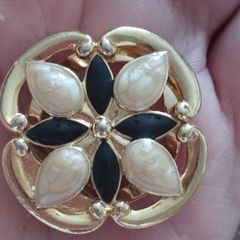 Vintage gold tone dress clip.