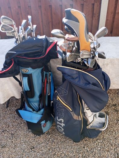 A selection of golf clubs and bags. All right handed clubs.