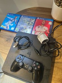 ps4 + controller, hdmi cable and 3 fifa games