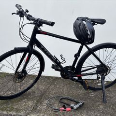 Trek mens bike with Bell helmet and Kryptonite lock
