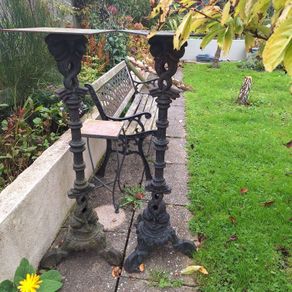 2 cast iron tall pub table legs.