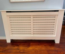 Cream console style radiator cover