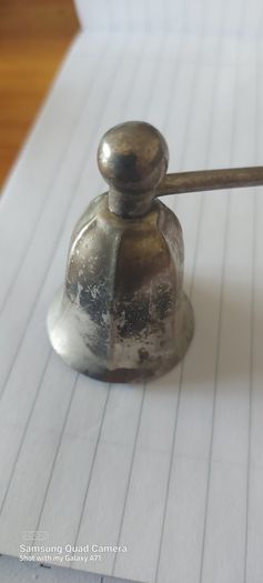 Candle metal snuffer ,,good patina for its age ,sold as seen