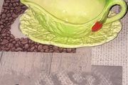 Carlton Ware sauce boat and saucer set, 1930s to 1960s featuring a distinctive green cabbage or lettuce leaf pattern with a red tomato motif