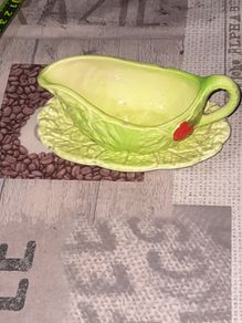 Carlton Ware sauce boat and saucer set, 1930s to 1960s featuring a distinctive green cabbage or lettuce leaf pattern with a red tomato motif