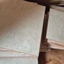 Beige stone-effect ceramic wall tiles Image 4