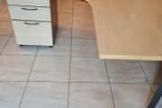 managers corner office desk with