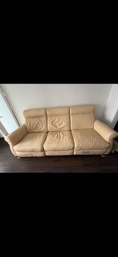 Free - Leather recliner sofa in cream-available end April